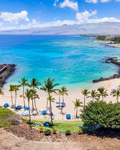White-sand cove for swimming and snorkeling